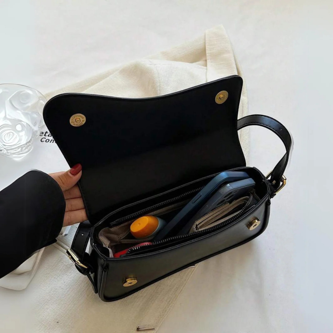 Elle - Minimalistička torba sa zakrivljenim ramenom i elegantnim dizajnom